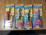Group of assorted Pez dispensers in packaging