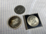 2 silver coins 1 one oz anniversary round