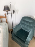 Upholstered chair and lamp