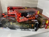 Shelf lot of Assorted NASCAR Toys and models