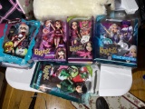 Group of 5 assorted Bratz dolls in boxes
