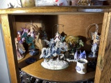 Very large shelf lot of dragon, Fairy figurines
