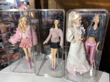 Group lot of 4 Barbie Dolls