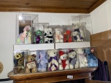 Group of Plush Toys in Cases
