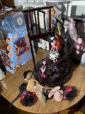 Group of dolls, spiral staircase, assorted hats etc