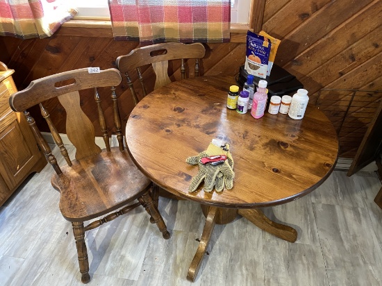 Pine table and two chairs