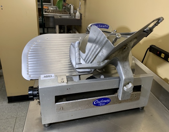 The Globe Chefmate  GC512  Manual Gravity Feed Slicer.  Works Great!