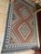 Rug 84 inches Long x 62 inches Wide