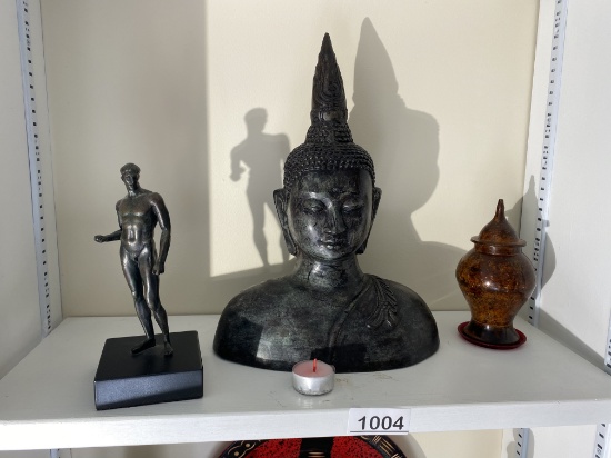 Metal statue of a man, buddha statue, small jar