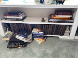 Two shelves of books and more