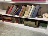 Two shelves of vintage books and more