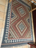 Rug 84 inches Long x 62 inches Wide