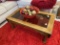 Glass topped coffee table with bowl, decorative veggies