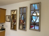Three decorative mirrors and a frame