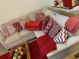 Pillows, blanket, bedspread on couch