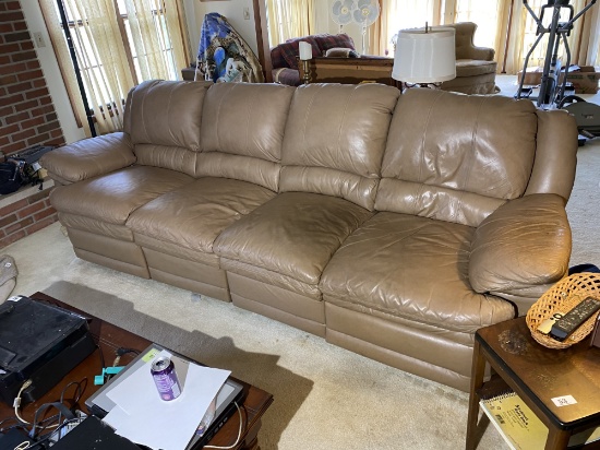 Large sized leather couch with recliner feature