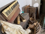 Antique pump organ in pieces