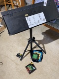 Music stand, Martin hat, guitar strings etc