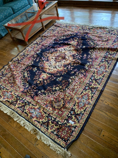 Area Rug 93 inches Long x 63 inches Wide.  See Photos for Damage.