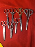 7 Pairs of Ornate Scissors.  Sone are Sterling.  See Photos For Extra Details