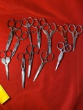 12 Pairs of Ornate Scissors.  See Photos For Extra Details