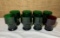 7 Heavy Green Glass Glasses and 1 Red .