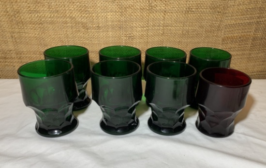 7 Heavy Green Glass Glasses and 1 Red .