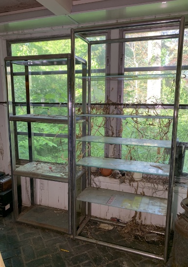 2 Chrome and Glass Shelving Units.  See Photos..