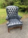 Vintage Sam Moore Faux Leather Wing Back Chair with Ember Finish .