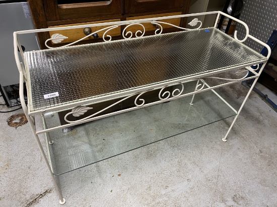 Wrought metal and glass garden table