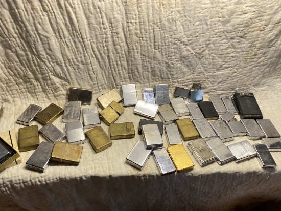 Large Group of Plain Zippo lighters