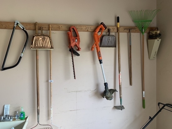 Wall lot of assorted tools in garage