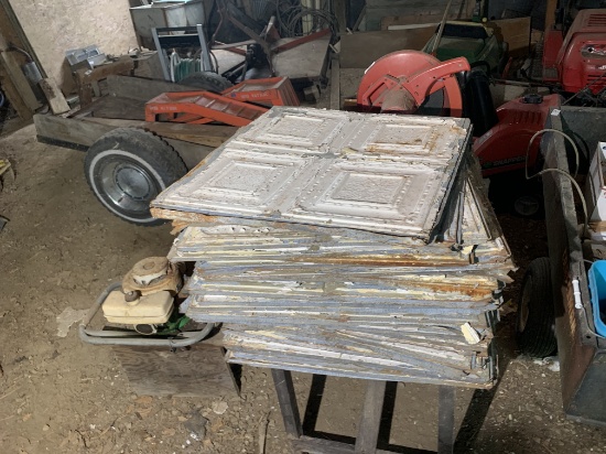 Stack of 24" x 24" tin Victorian Ceiling Tiles