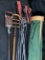 Group lot of vintage golf clubs plus two portable spike seats