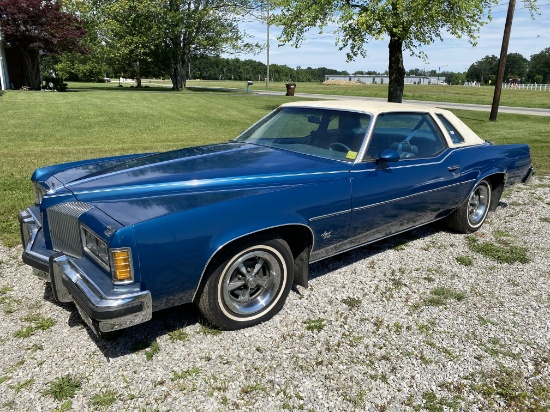 Total Estate w/Pristine 1976 Pontiac Grand Prix.