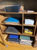 Shelf contents including 33 records, camera in box