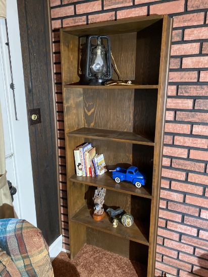 Contents of shelf including Old Lantern, Truck Vase, paperweight