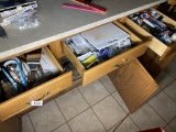 Items in drawers and cupboards of kitchen island lot