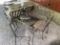 Wrought iron and glass topped vintage patio table and chairs