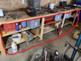 Group lot of misc items under the tool bench