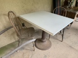 Pedestal Table with 2 Chairs.