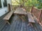 Picnic Table with 2 Benches, Lounge Chairs & Potted Plants.