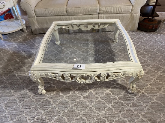 White and glass top coffee table