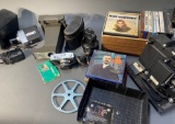Cameras, projector, audio reels, binoculars lot