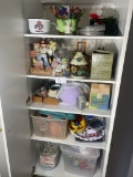 Cupboard lot of holiday and entertaining items