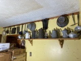 Large lot of primitives hanging on wall