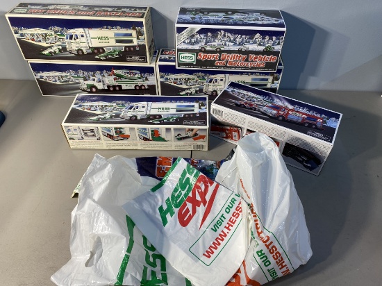 Large Lot of Hess Collectible Vehicles in boxes