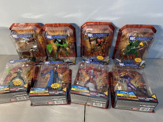 Group ot DC Universe Super Heroes Action Figures in packaging