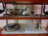 Contents of Red Metal Shelves: Wall Clock, Decorative Bell, Candle Holders, Art Glass, Angel