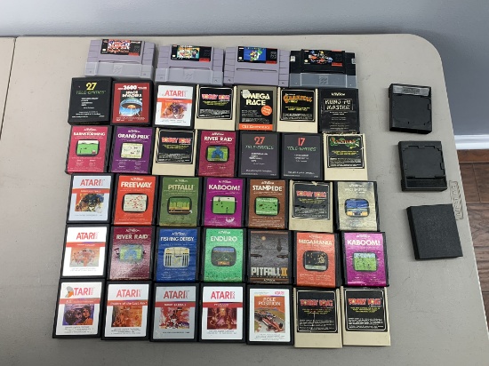 Large Group of Atari Games with 4 Super Nintendo Games